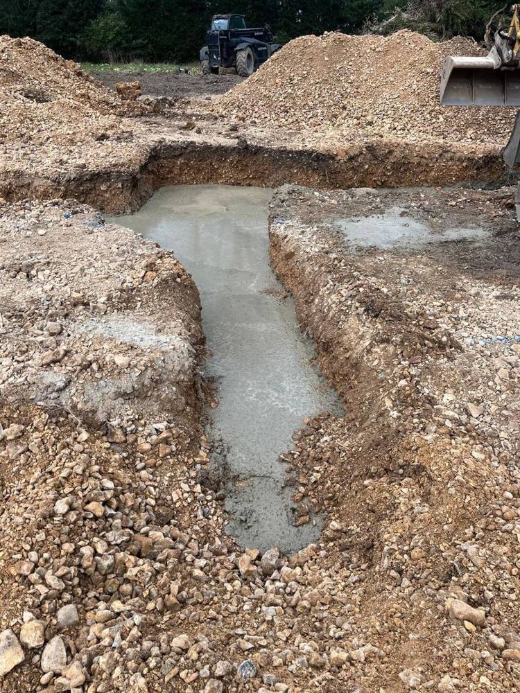 Concrete filling a foundation trench